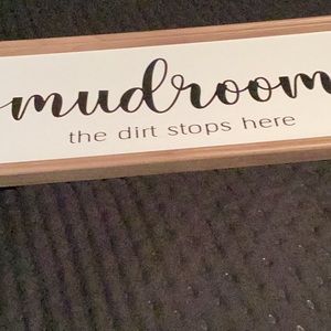 Large sign says MUDROOM the dirt stops here